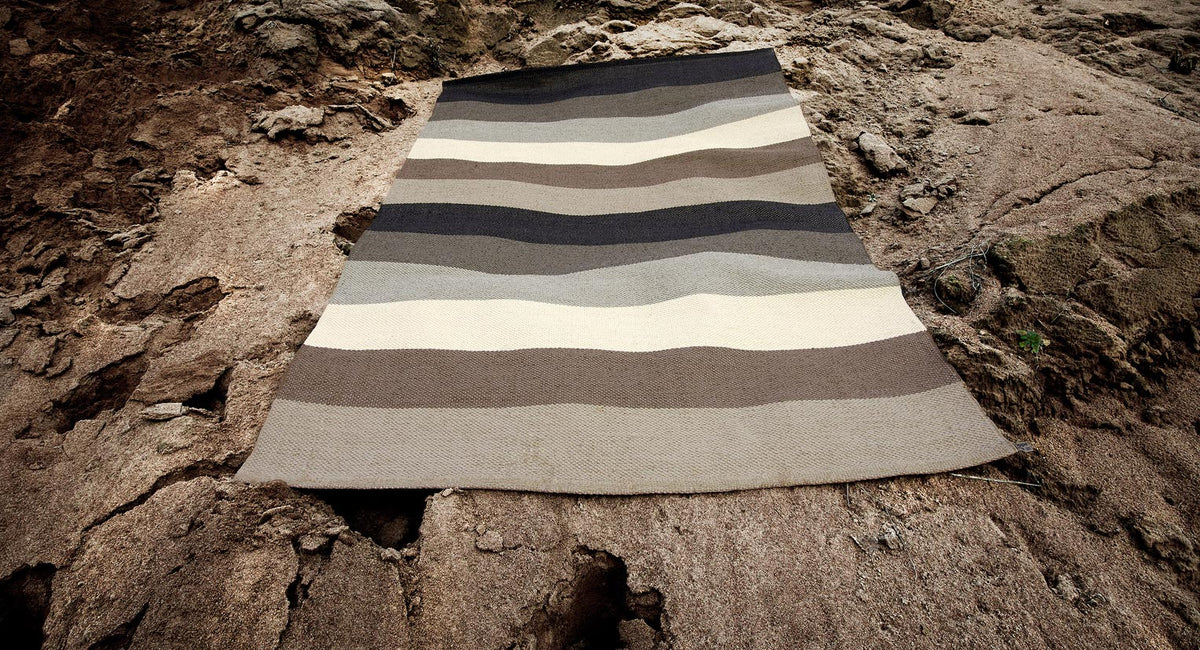 Molly Mud Runner Rug by Pappelina, showing molly mud runner rug in live shot.