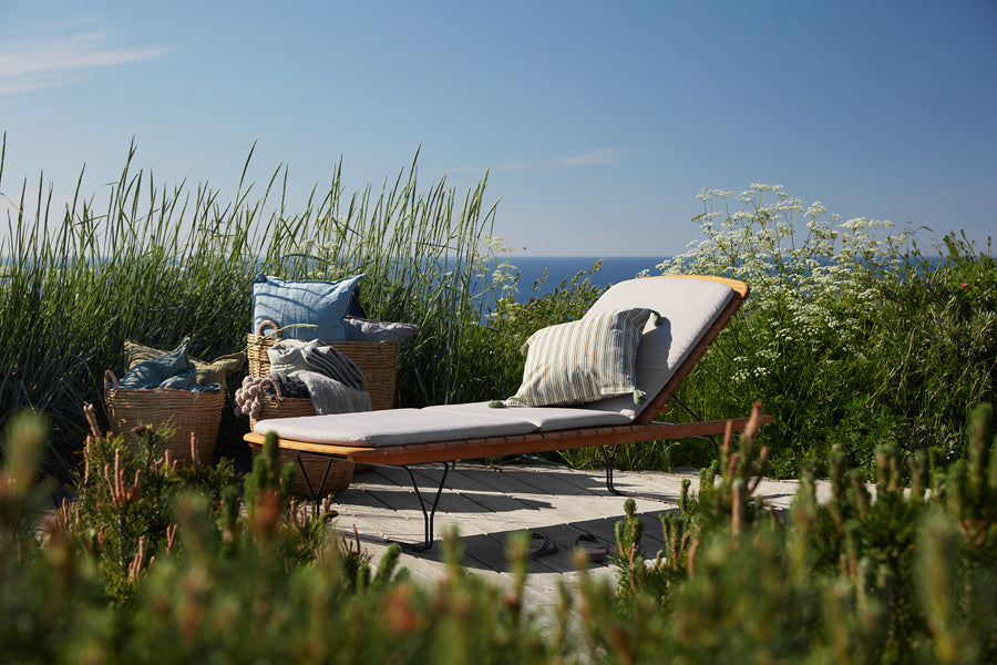 Molo Outdoor 5-Position Sunbed by Houe, showing molo 5-position sunbed in lve shot.