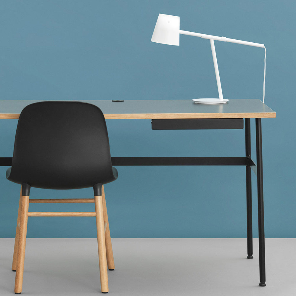 Momento US Table Lamp by Normann Copenhagen, showing momento us table lamp in live shot.