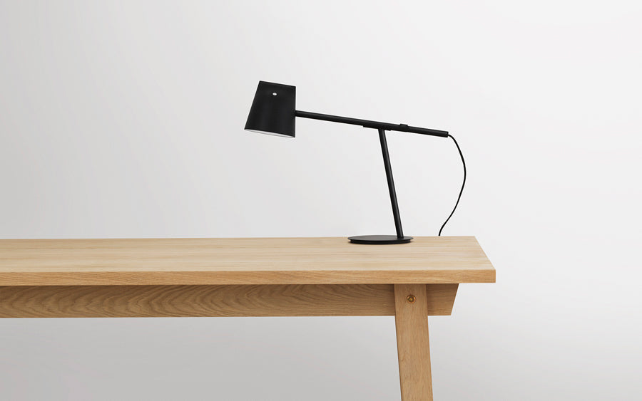 Momento US Table Lamp by Normann Copenhagen, showing momento us table lamp in live shot.