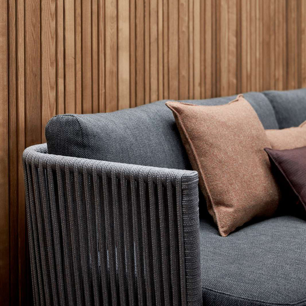 Moments Indoor 3-Seater Sofa by Cane-Line, showing closeup view of moments indoor 3-seater sofa in live shot.