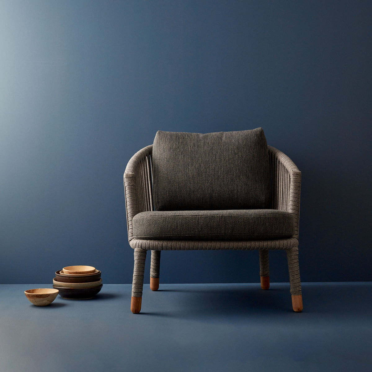 Moments Indoor Lounge Chair by Cane-Line, showing moments indoor lounge chair in live shot.