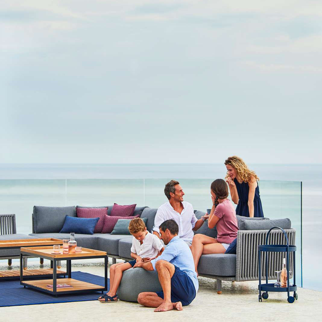 Moments Outdoor Sectional by Cane-Line, showing moments outdoor sectional in live shot.