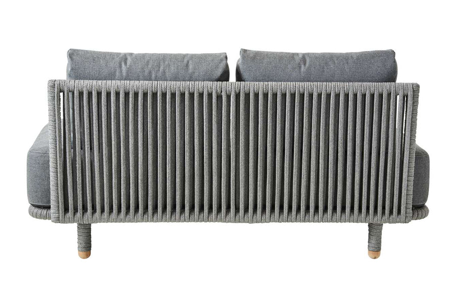 Moments Outdoor Sectional by Cane-Line, showing back view of moments outdoor sectional in grey airtouch cushion set.