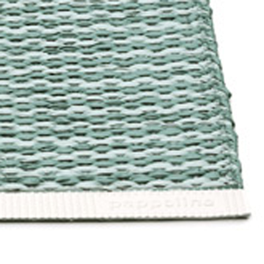 Mono Jade & Pale Turquoise Rug by Pappelina, showing closeup view of mono jade & pale turquoise rug.
