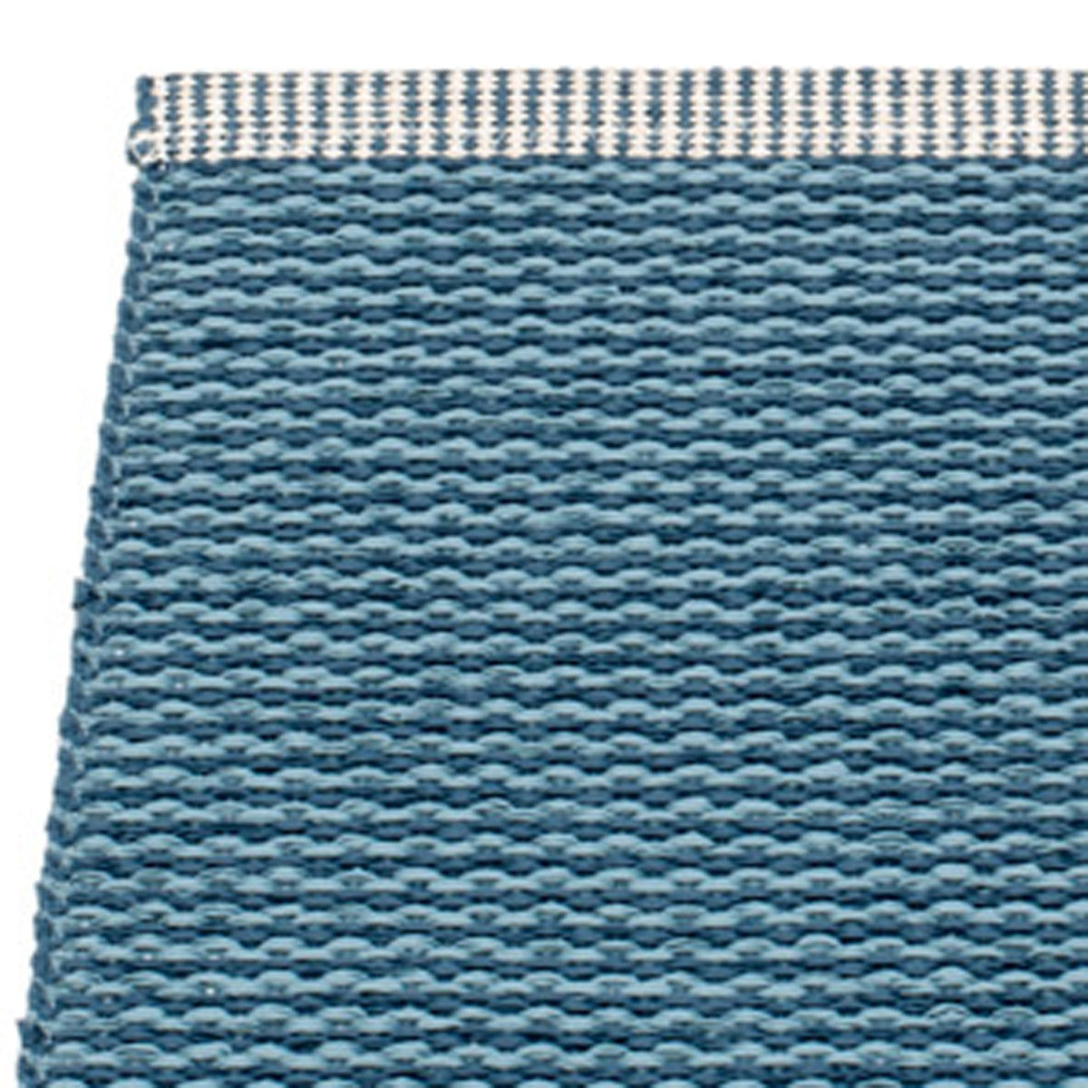 Mono Ocean Blue Runner Rug by Pappelina, showing closeup view of mono ocean blue runner rug.