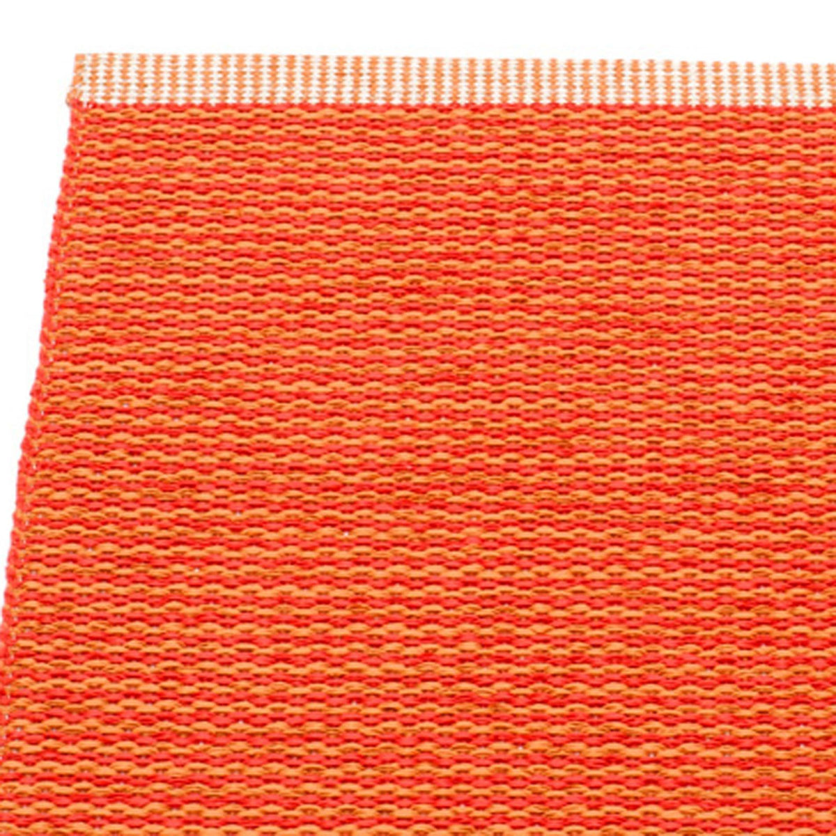 Mono Pale Orange Rug by Pappelina, showing closeup view of mono pale orange runner rug.
