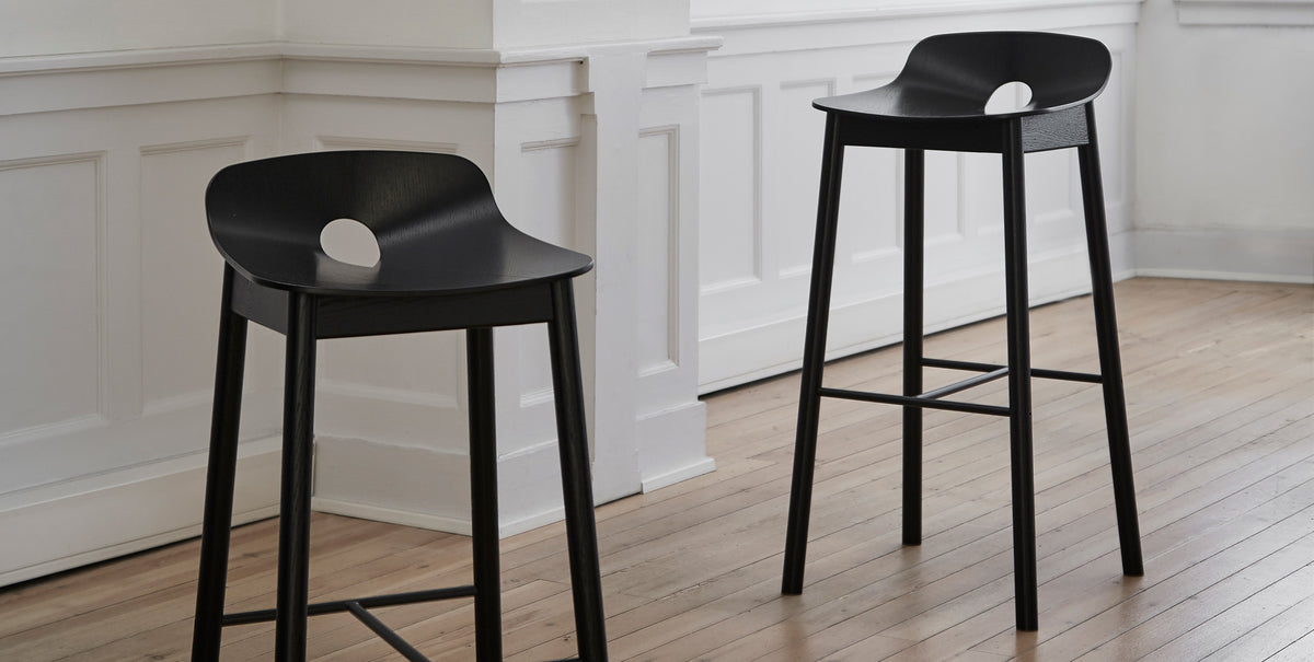 Mono Stool/Chair by Woud, showing mono stools/chairs in live shot.