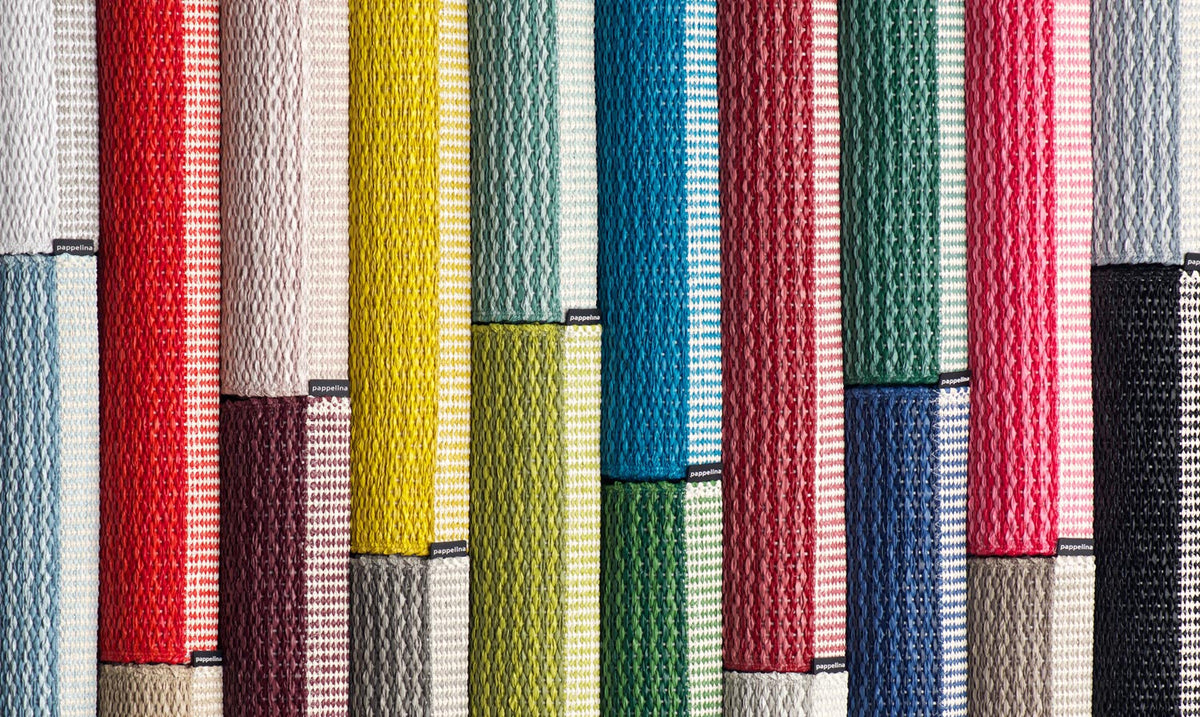 Mono White Rug by Pappelina, showing closeup view of mono rug in multiple colors.