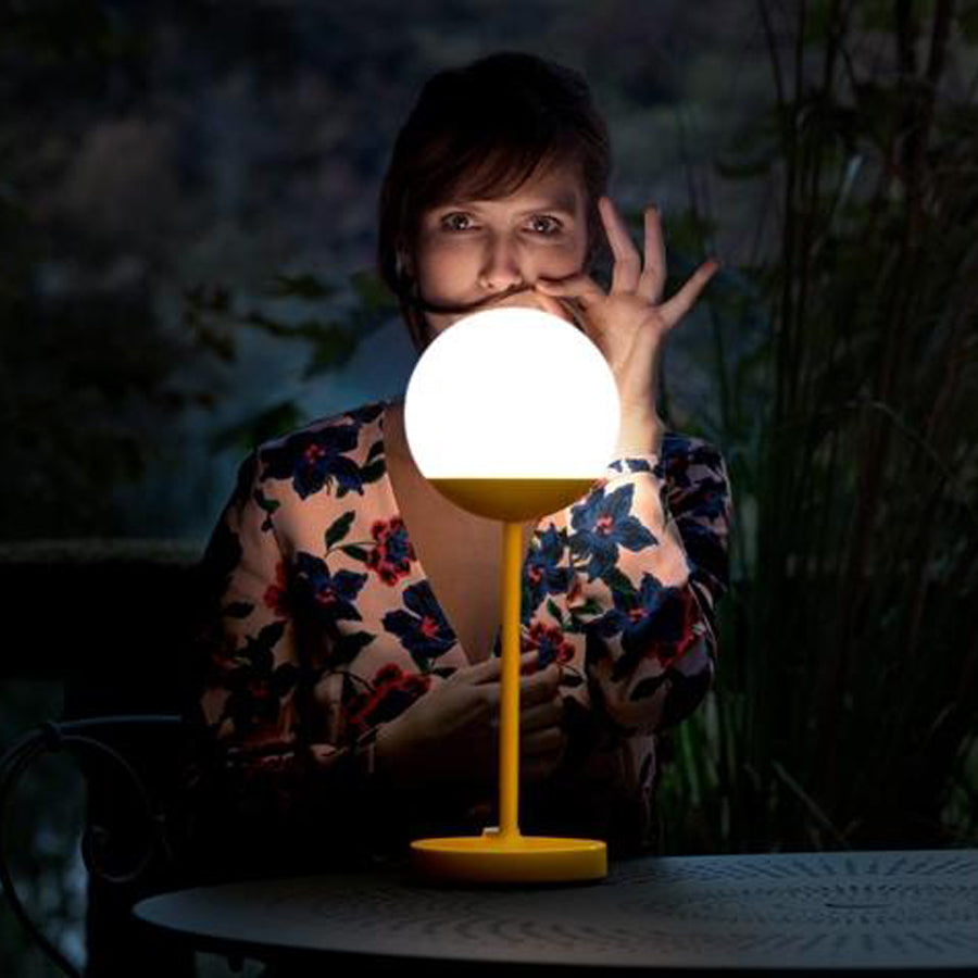 Mooon Lamps by Fermob, showing lamp & table in live shot.