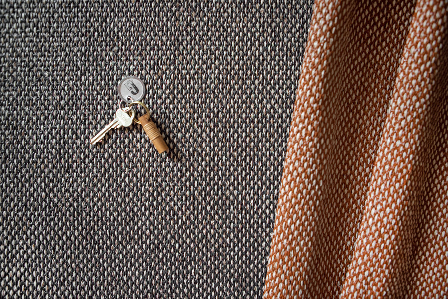 Moor Woven Plastic Rug by Brita, showing closeup view of moor woven plastic rug in live shot.