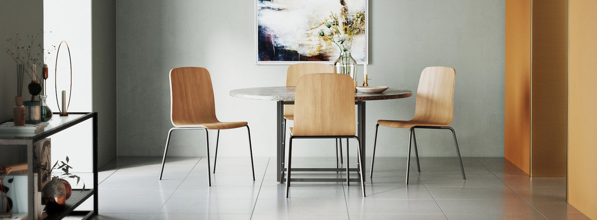 Morro Dining Chair by Kollektiff, showing morro dining chairs with table in live shot.