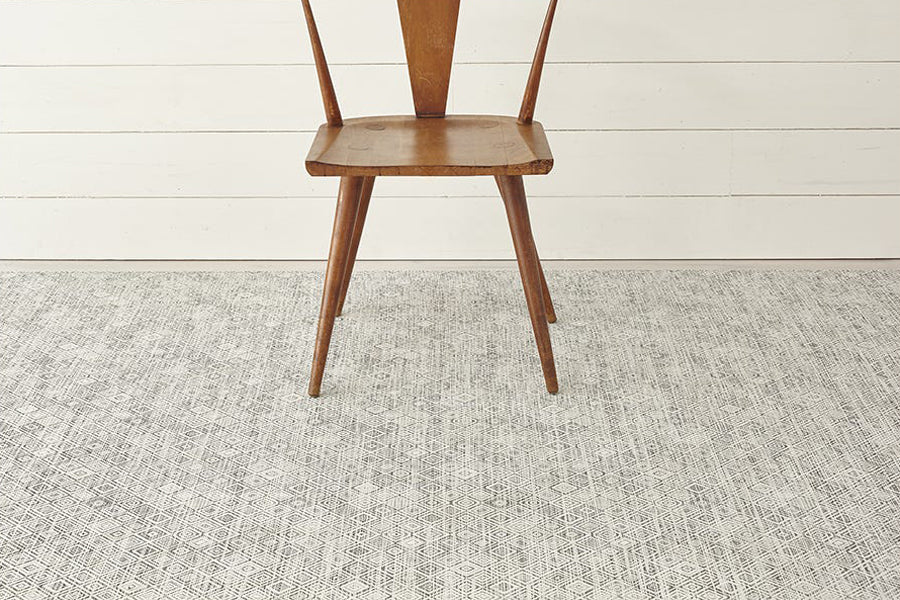 Mosaic Woven Floor Mat by Chilewich, showing mosaic woven floor mat in live shot.