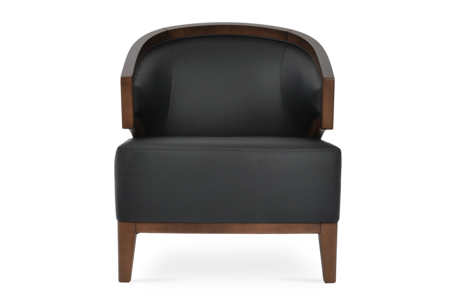 Mostar Arm Chair by SohoConcept, showing front view of arm chair with table.