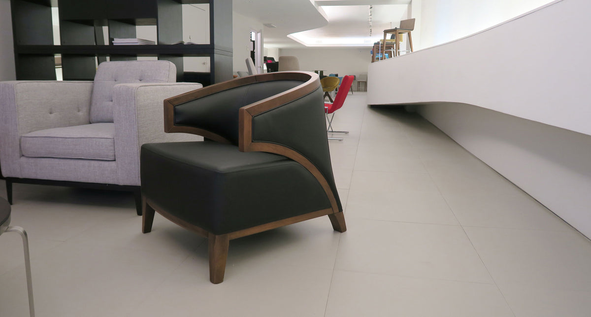 Mostar Arm Chair by SohoConcept, showing angle view of arm chair in live shot.