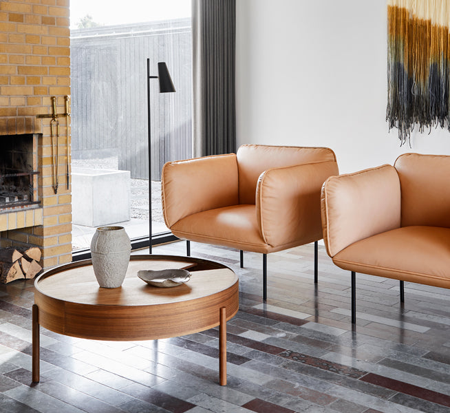 Nakki Armchair by Woud, showing nakki armchair in live shot.
