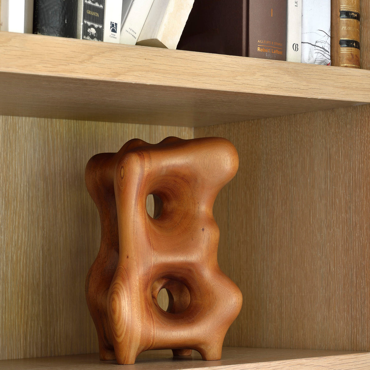 Natural Organic Sculpture by Ethnicraft, showing front view of sculpture in the live shot.