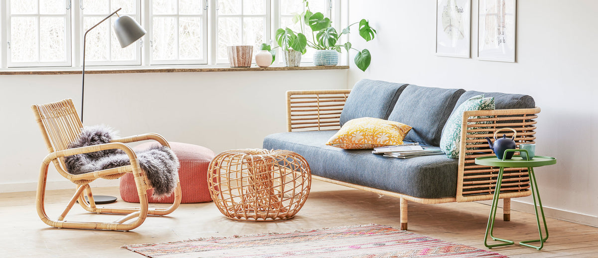 Nest Indoor Coffee Table/Footstool by Cane-Line, showing nest indoor coffee table/footstool in live shot.