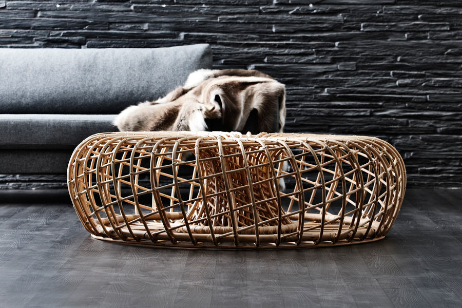 Nest Indoor Coffee Table/Footstool by Cane-Line, showing nest indoor coffee table/footstool in live shot.