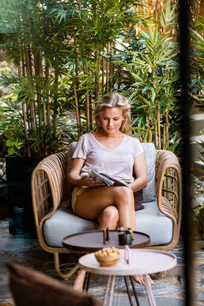 Nest Outdoor Lounge Chair by Cane-Line, showing nest outdoor lounge chair in the live shot.