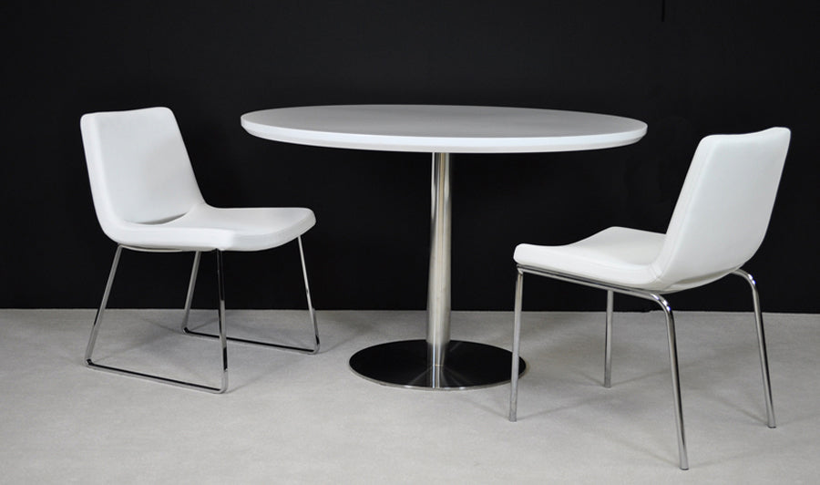 Nevada Sled Dining Chair by SohoConcept, live shoot of the chair with table.