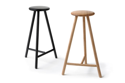 Linea Perch Bar Stool by Nikari, showing linea perch bar stool in natural oil oak and black stained oak.