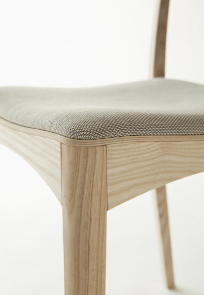 October Light Chair by Nikari, showing detail view of upholstery seat of october light chair.