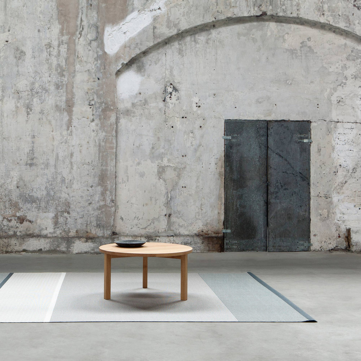 Periferia Round Coffee Table by Nikari, showing periferia round coffee table in live shot.