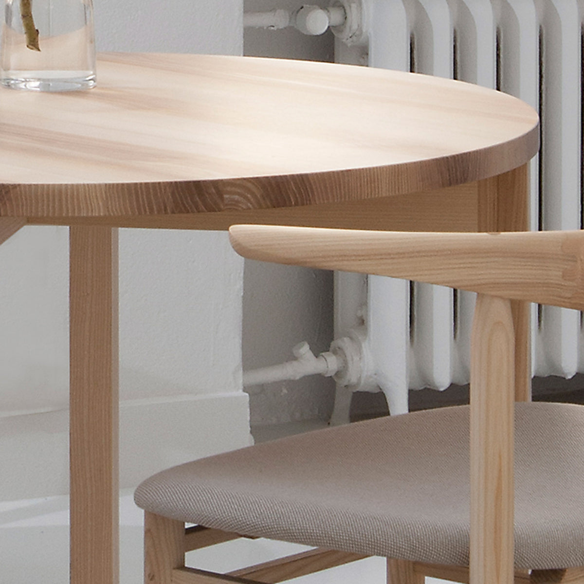 Periferia Dining Table by Nikari, showing detail view of periferia dining table in live shot.