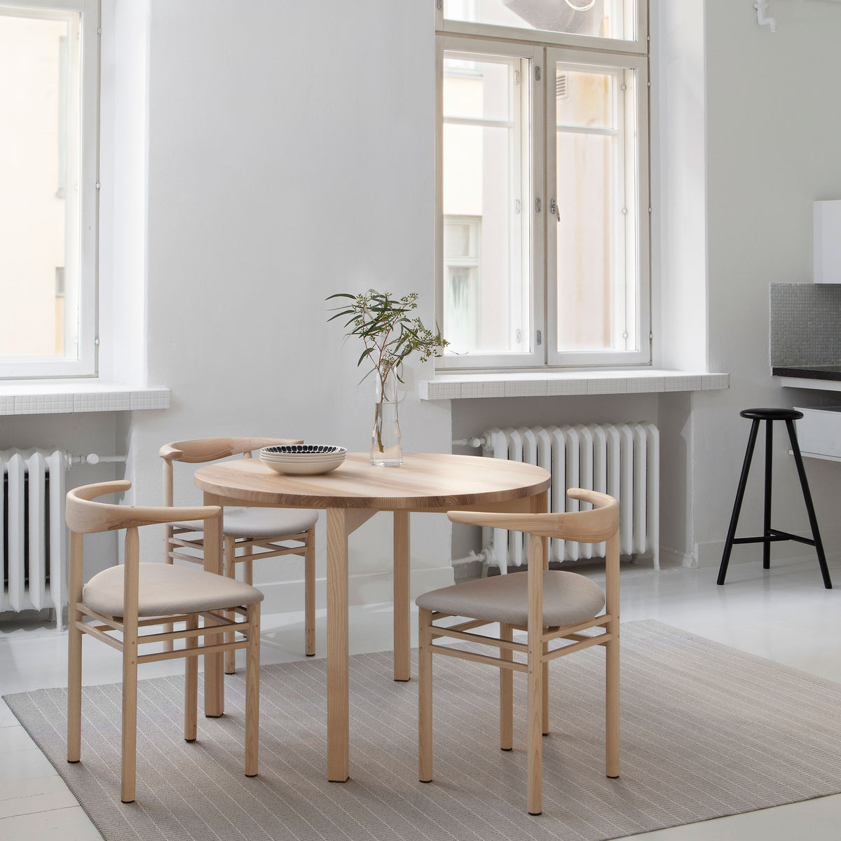 Periferia Dining Table by Nikari, showing periferia dining table in live shot.