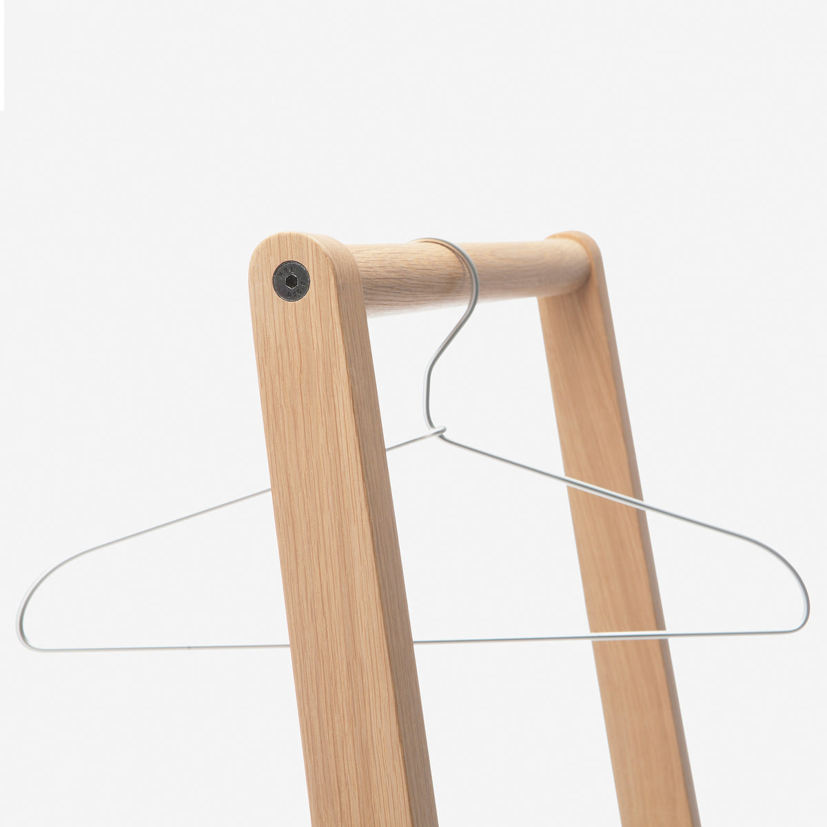 Skandinavia Coat Rack by Nikari, showing skandinavia coat rack with hanger in live shot.