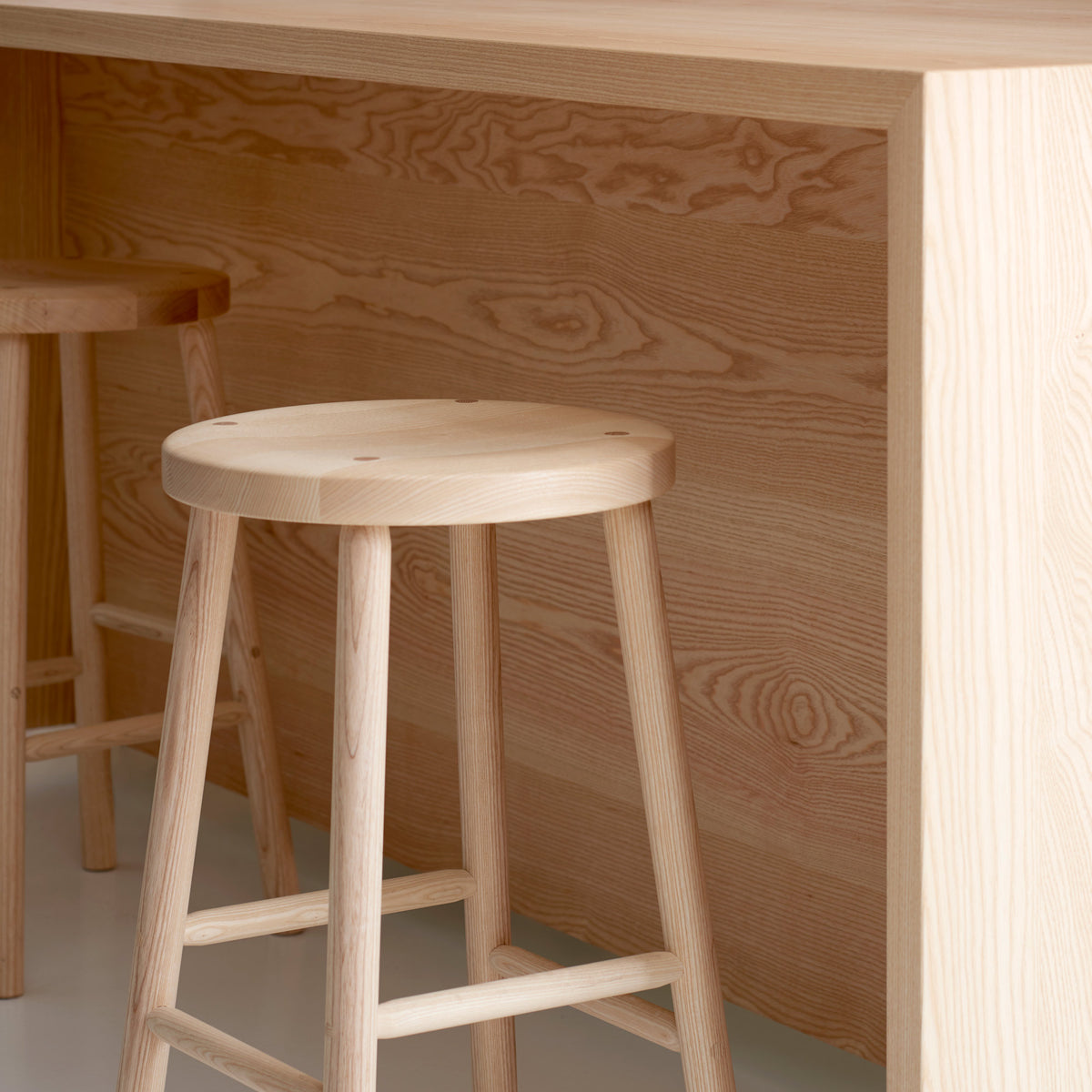 Storia Stool by Nikari, showing closeup view of storia stool in live shot.