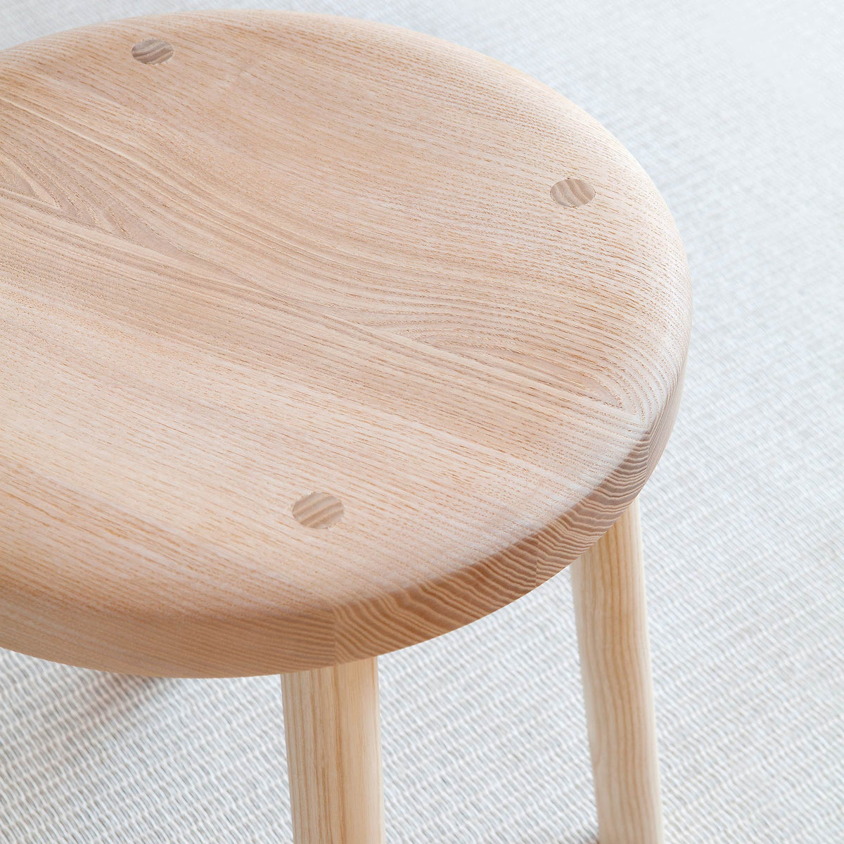 Storia Stool by Nikari, showing detail top view of storia stool in live shot.