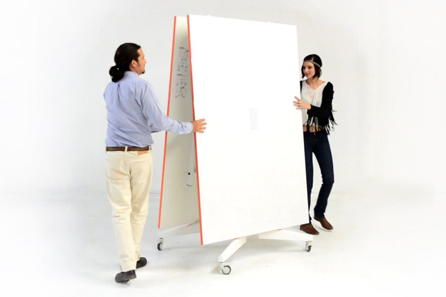 Nomad Folding Conference and Ping Pong Table by Scale 1:1, showing folded view of nomad folding conference and ping pong table in white/tangerine.