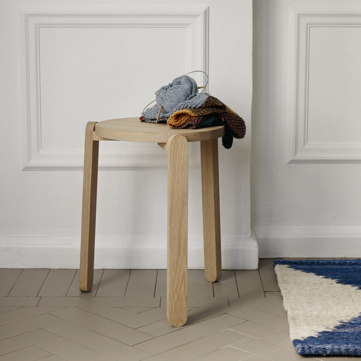Nomad Stool by Skagerak, showing nomad stool in live shot.