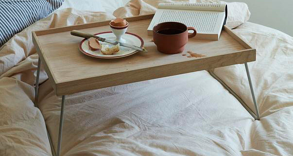 Nomad Table Tray by Skagerak, showing closeup view of nomad table tray in live shot.