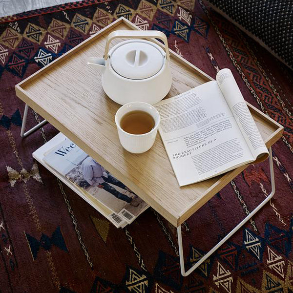 Nomad Table Tray by Skagerak, showing closeup view of nomad table tray in live shot.