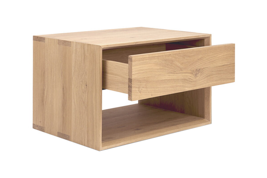 Nordic ll Nightstand by Ethnicraft, showing angle view of nordic ii oak nighstand in solid oak/15" high standing.