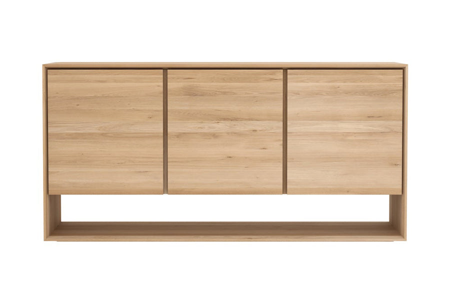 Nordic Sideboard by Ethnicraft, showing front view of nordic oak sideboard in oak/62" x 18" 3 doors.