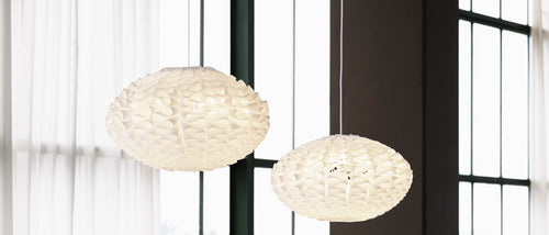 Norm Pendant Lamp by Normann Copenhagen, showing norm pendant lamps in live shot.