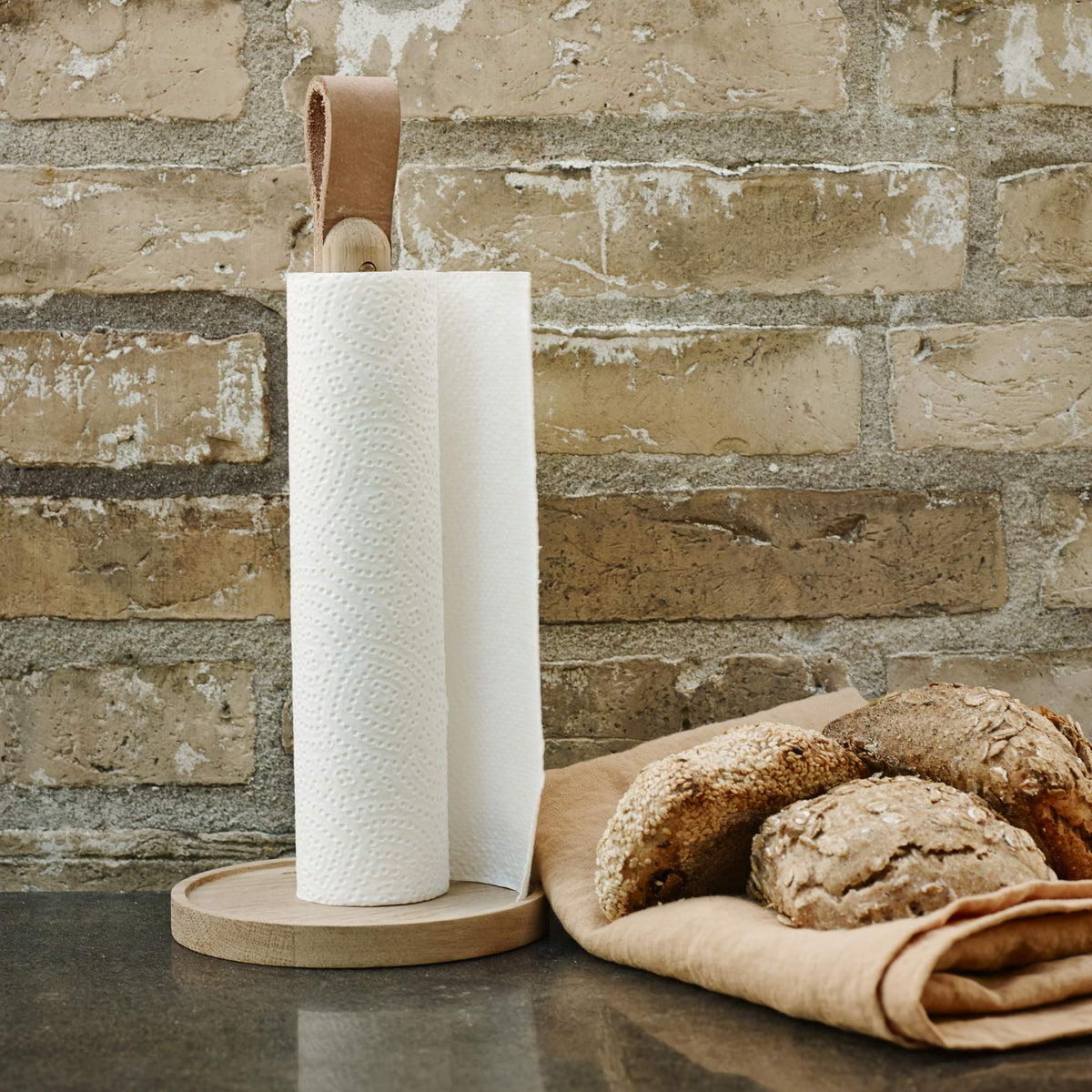 Norr Paper Towel Holder by Skagerak, showing norr paper towel holder in live shot.