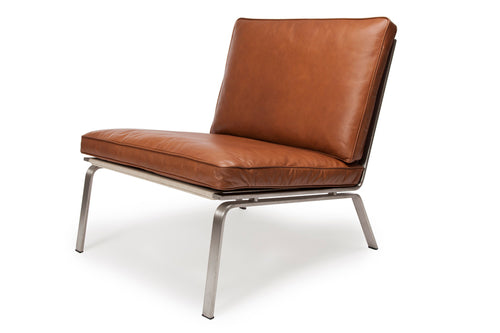 Man Lounge Chair by Norr11, showing corner view of man lounge chair.