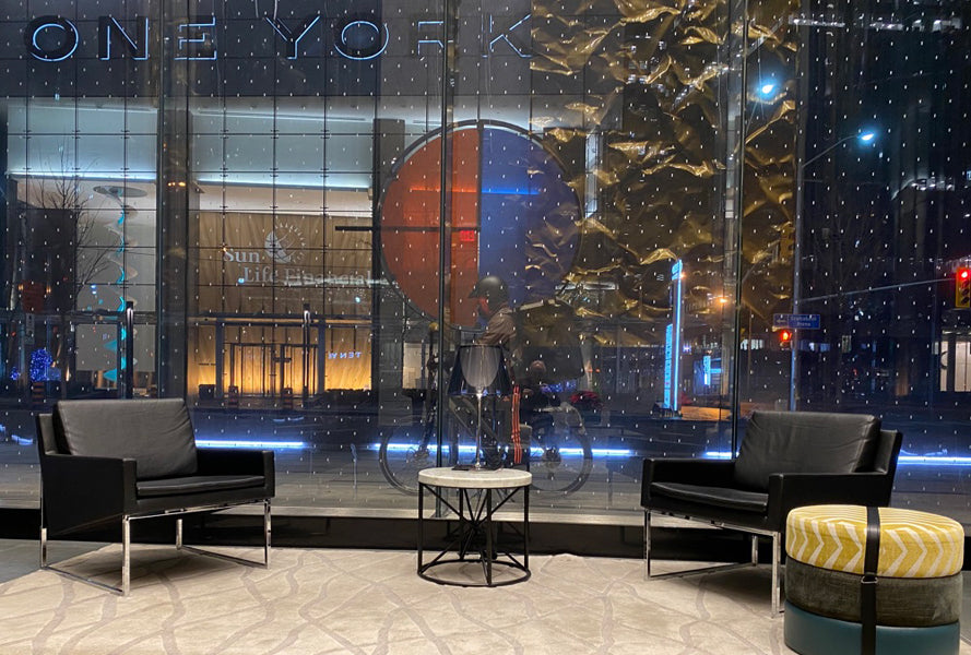Nova Sled Armchair by SohoConcept, showing two nova sled armchairs in live shot.