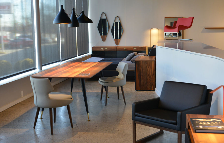 Nova Wood Arm Chair by SohoConcept, showing angle wood arm chair in live shot.