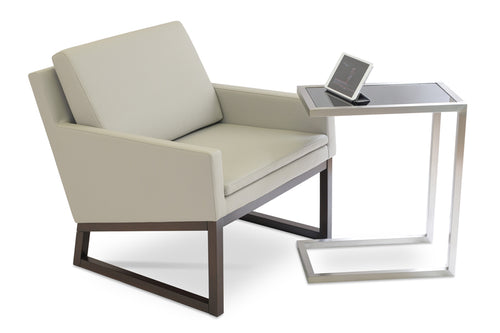 Nova Wood Arm Chair by SohoConcept, showing angle view of wood arm chair with table in live shot.