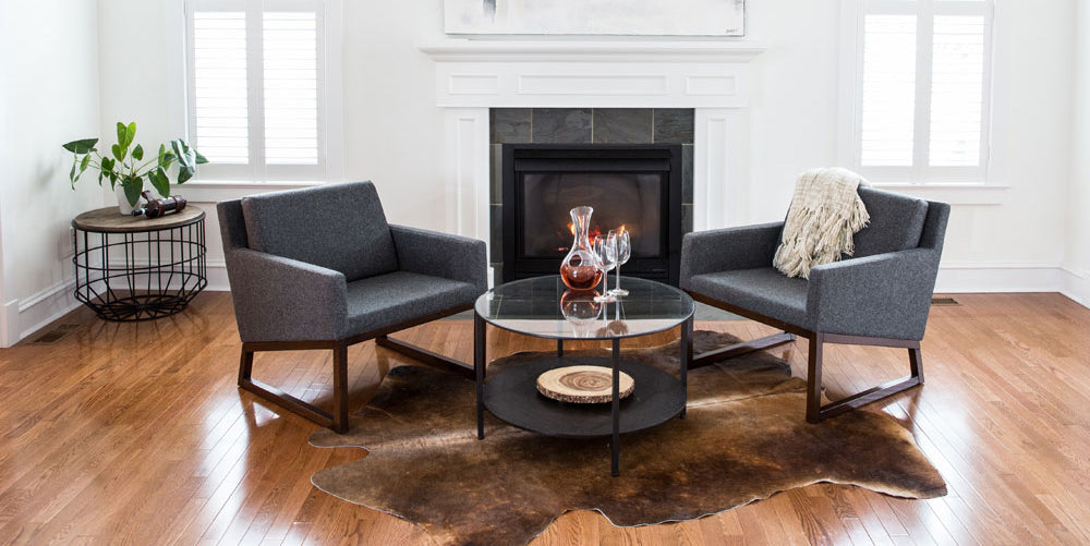 Nova Wood Arm Chair by SohoConcept, showing two wood arm chairs with table in live shot.