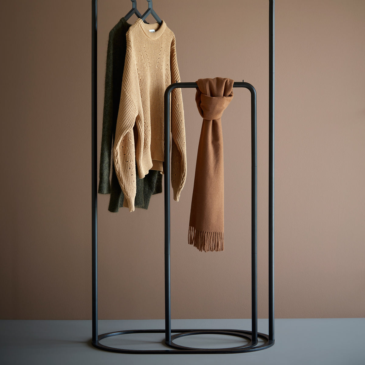 O&O Clothes Rack by Woud, showing o&o clothes racks in live shot.