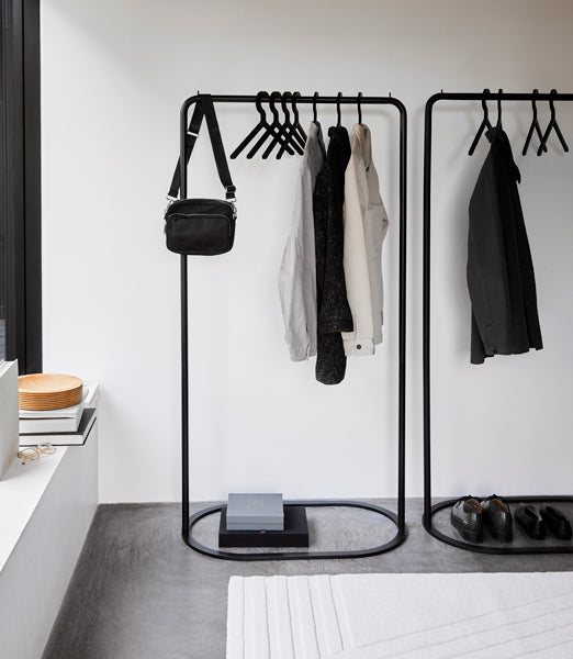 O&O Clothes Rack by Woud, showing o&o clothes racks in live shot.