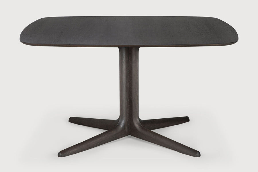 Corto Dining Table by Ethnicraft, showing front view of corto dining table.