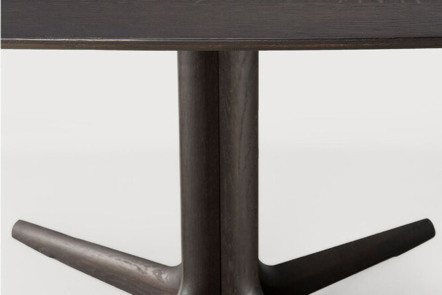 Corto Dining Table by Ethnicraft, showing closeup view of corto dining table.